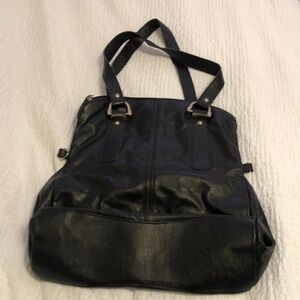 Vera Pelle black leather shoulder bag with silver hardware. Made in Italy.